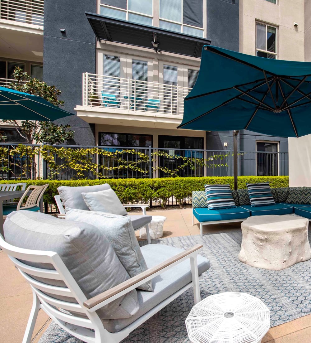 Relaxing outdoor common area with a water feature at Sofi Warner Center in Woodland Hills, California