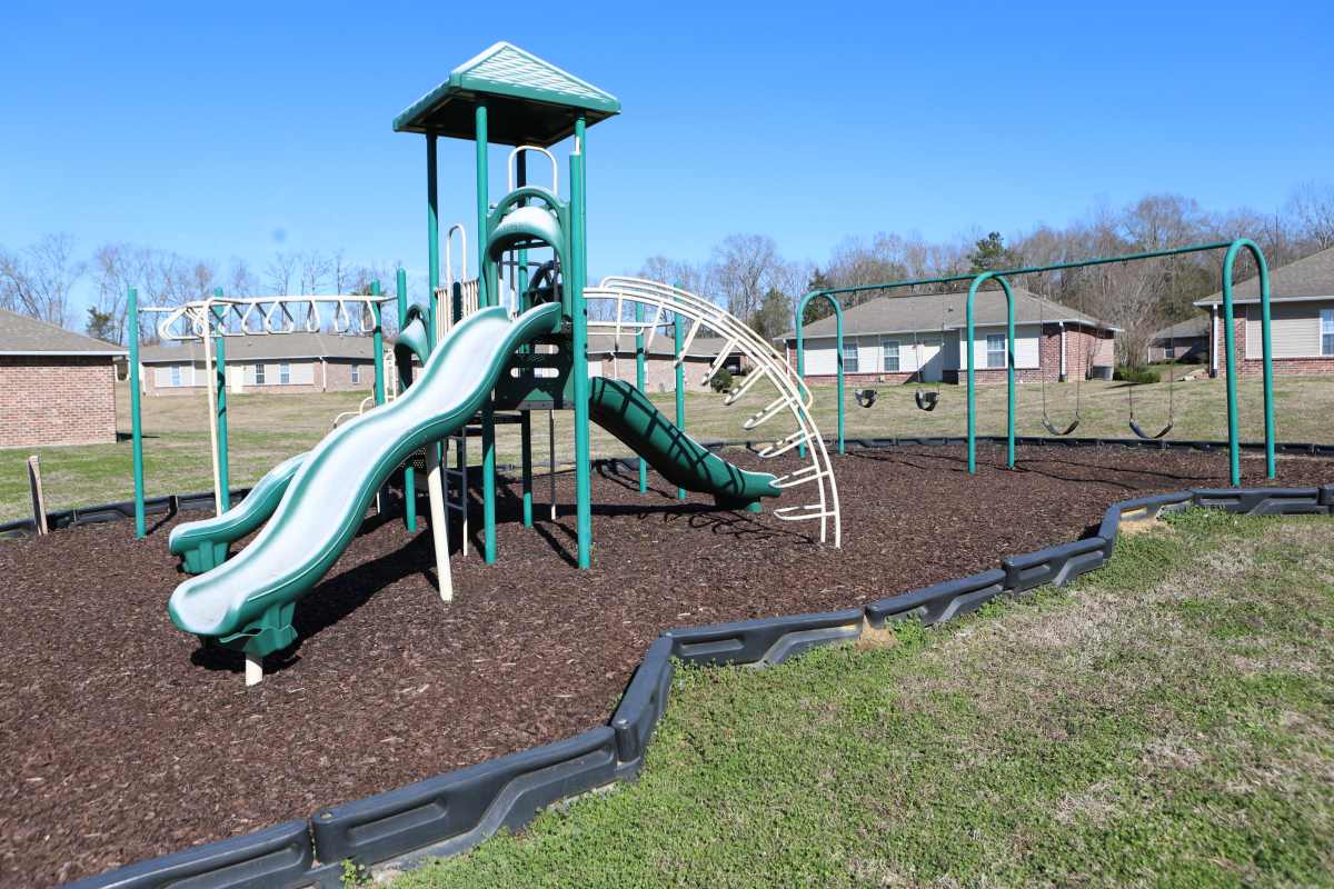 Playground with slides and swings near Shaw Estates in Jackson, Mississippi