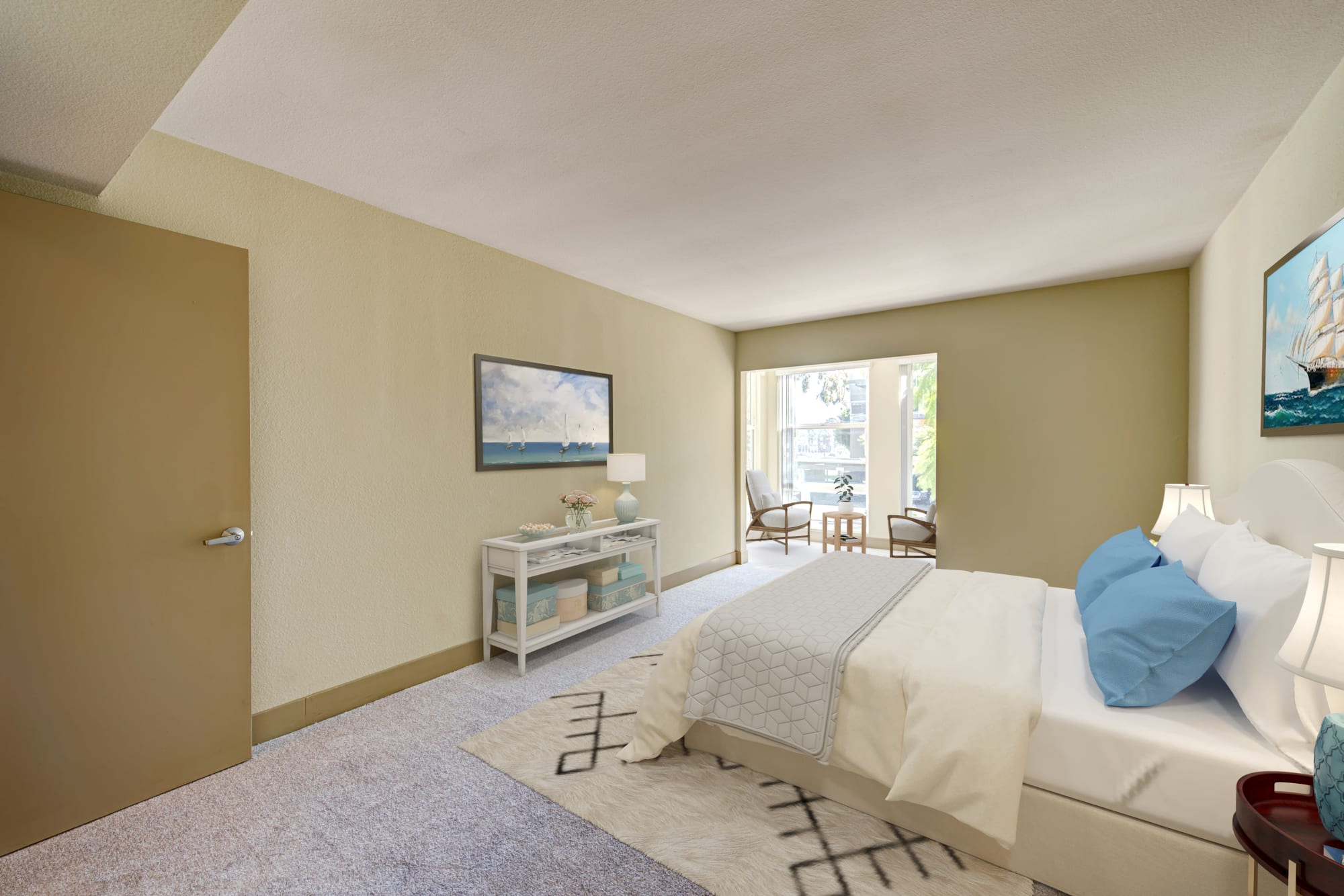 A spacious bedroom and sunroom at Harborside Marina Bay Apartments in Marina del Rey, California