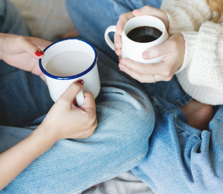 Residents enjoying their morning coffee together in their new home at Harbor Point Apartments in Mill Valley, California
