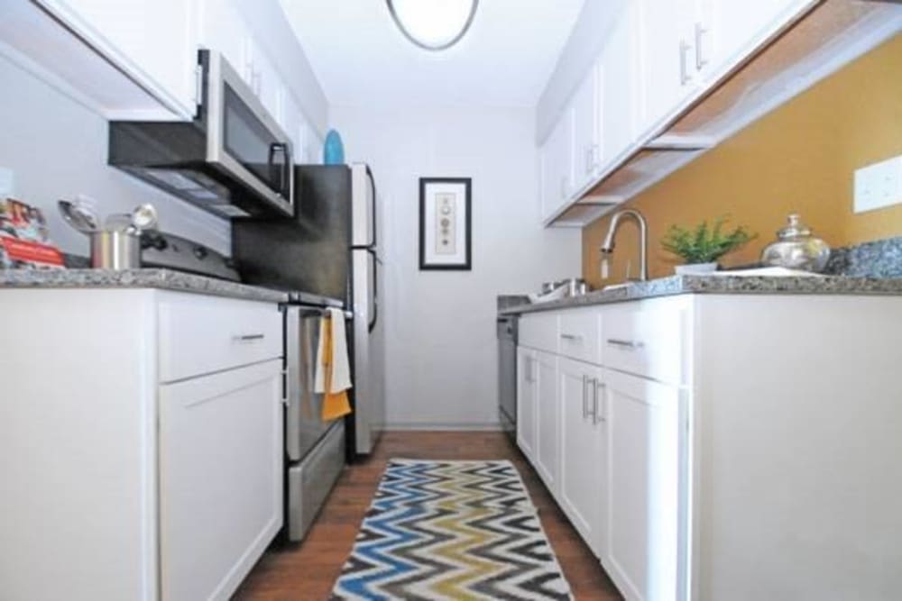 Kitchen with plenty of cabinetry at Goldelm at Metropolitan in Knoxville, Tennessee