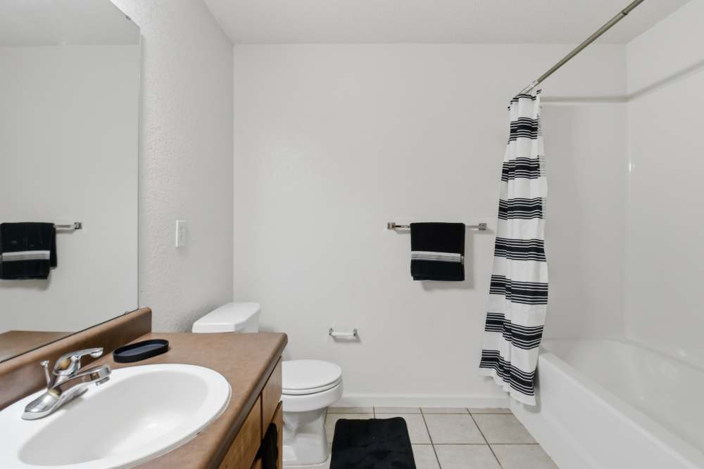 Bathroom with bathtub at Avalon Park in Brownfield, Texas