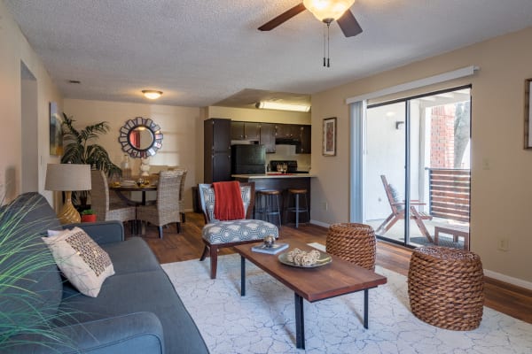 Furnished living room and dining area at Presidio Apartments in Allen, Texas