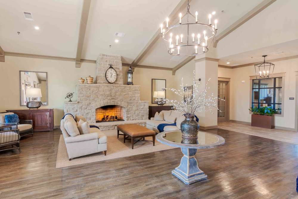 Clubhouse with chandelier at Boulders at Overland Park Apartments in Overland Park, KS