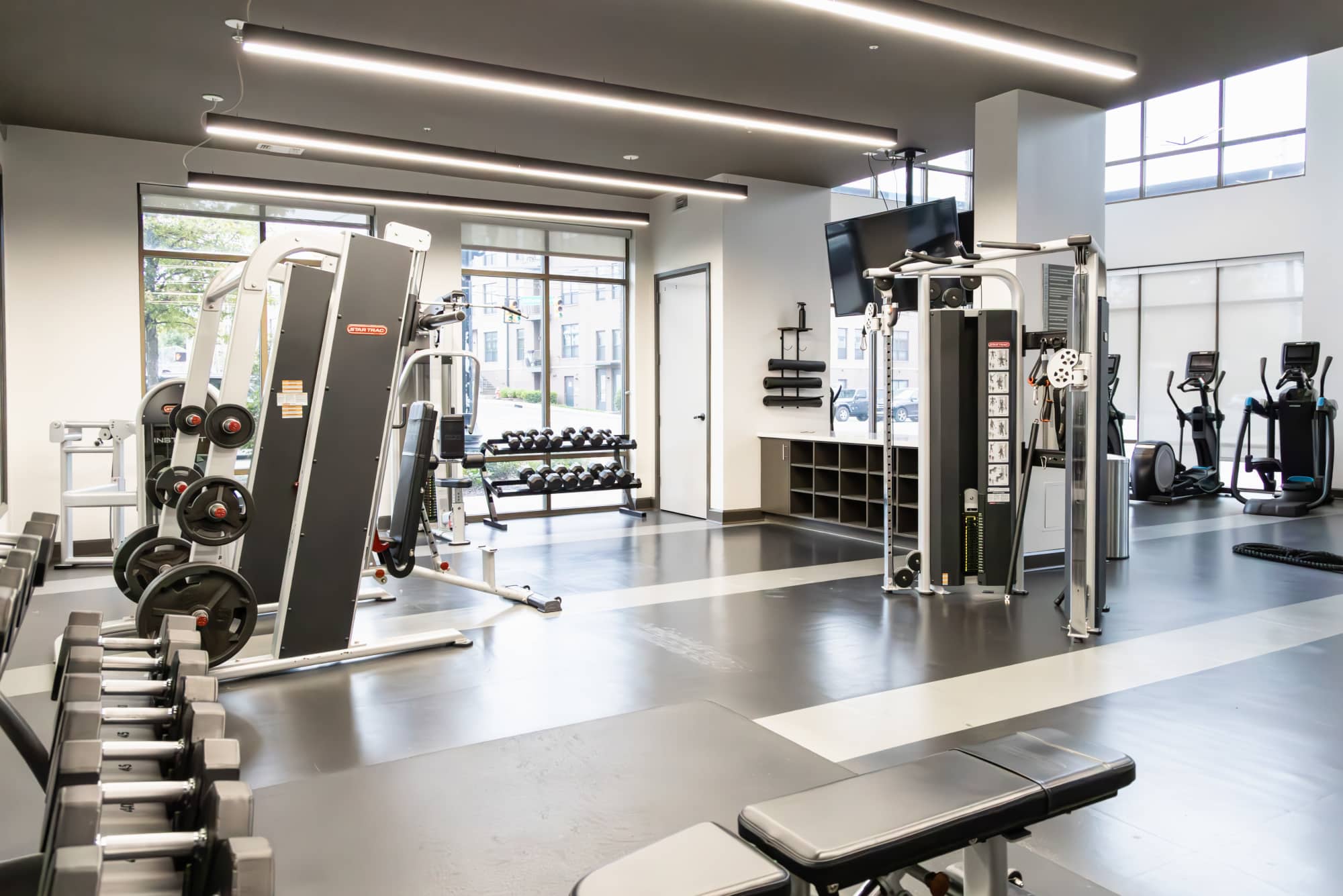 Community gym with free weights and equipment at The Carillon in Nashville,Tennessee