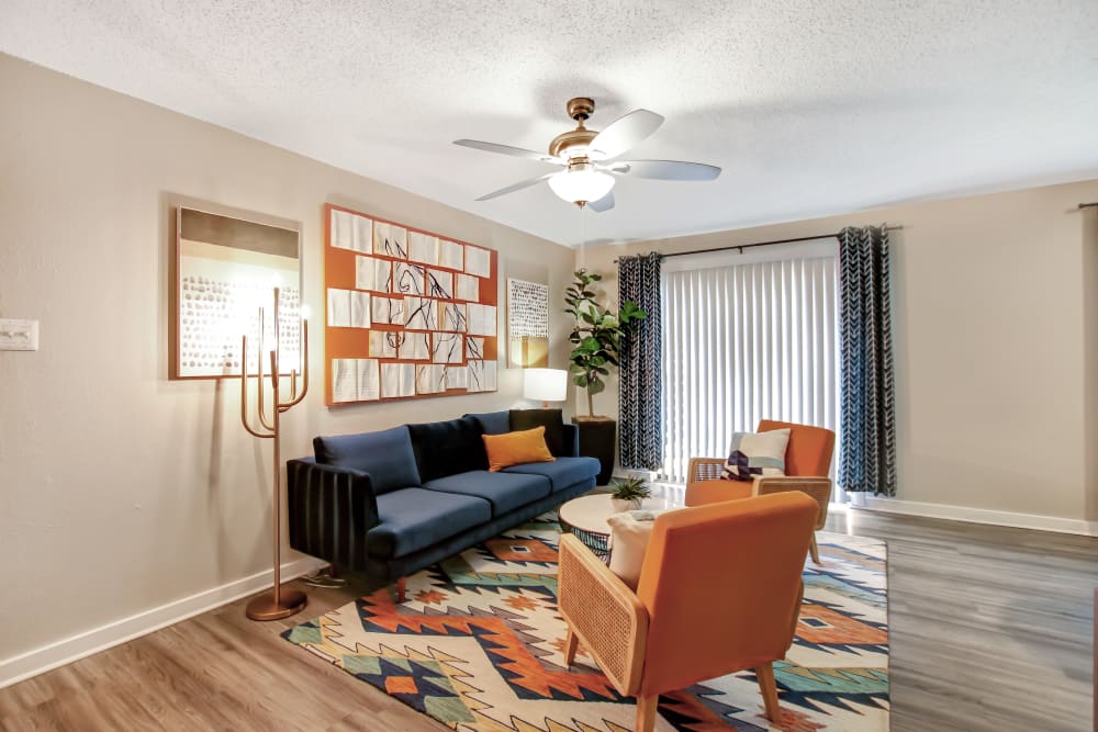 Hardwood floors in the living rooms at Lockhart Apartment Homes in Mesquite, Texas