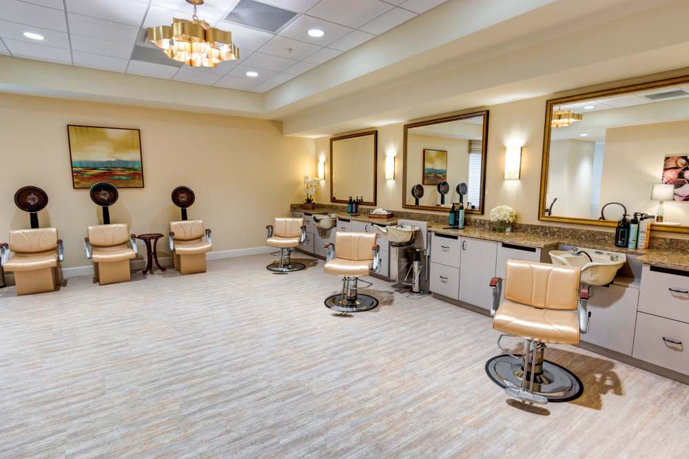 Salon with stylish, modern hair stations at Barclay House of Stuart in Stuart, Florida