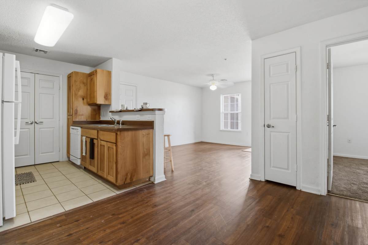 Unfurnished dining room with kitchen view at Avalon Park in Brownfield, Texas