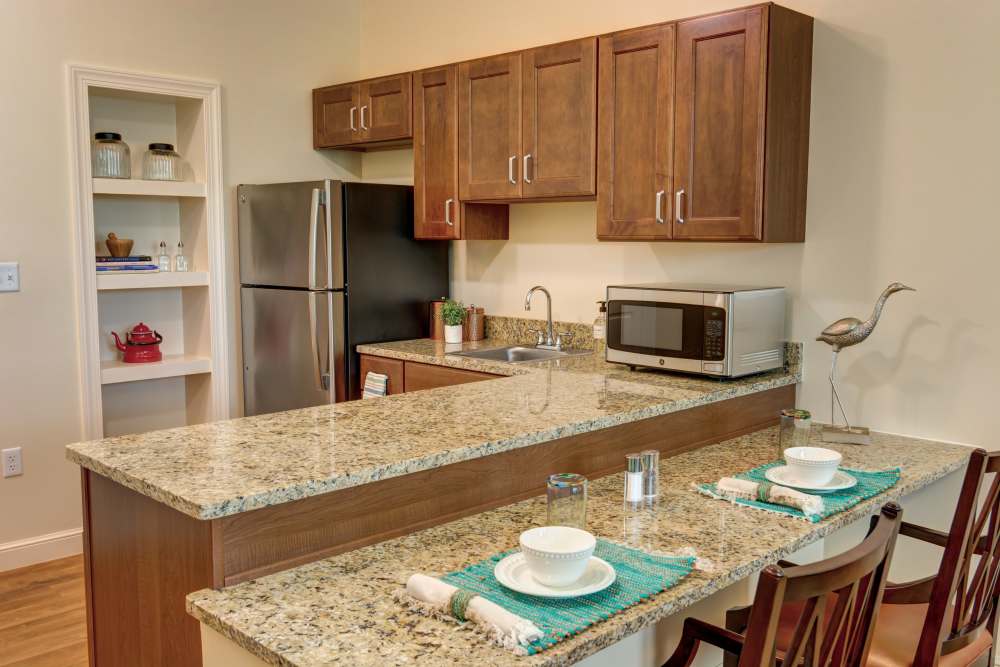 Granite countertops, stainless steel appliances at Barclay House of Stuart in Stuart, Florida
