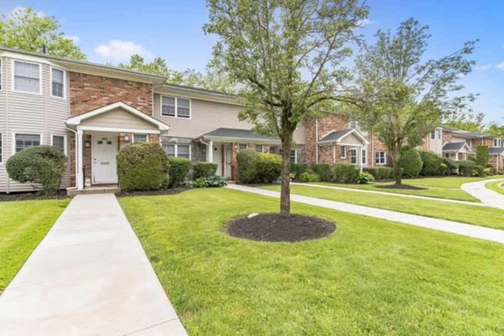 Property with sidewalk at Eagle Rock Apartments at Woodbury in Woodbury, New York