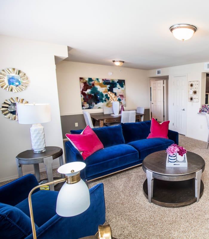 Carpeted living room at Tuscany Place in Lubbock, Texas