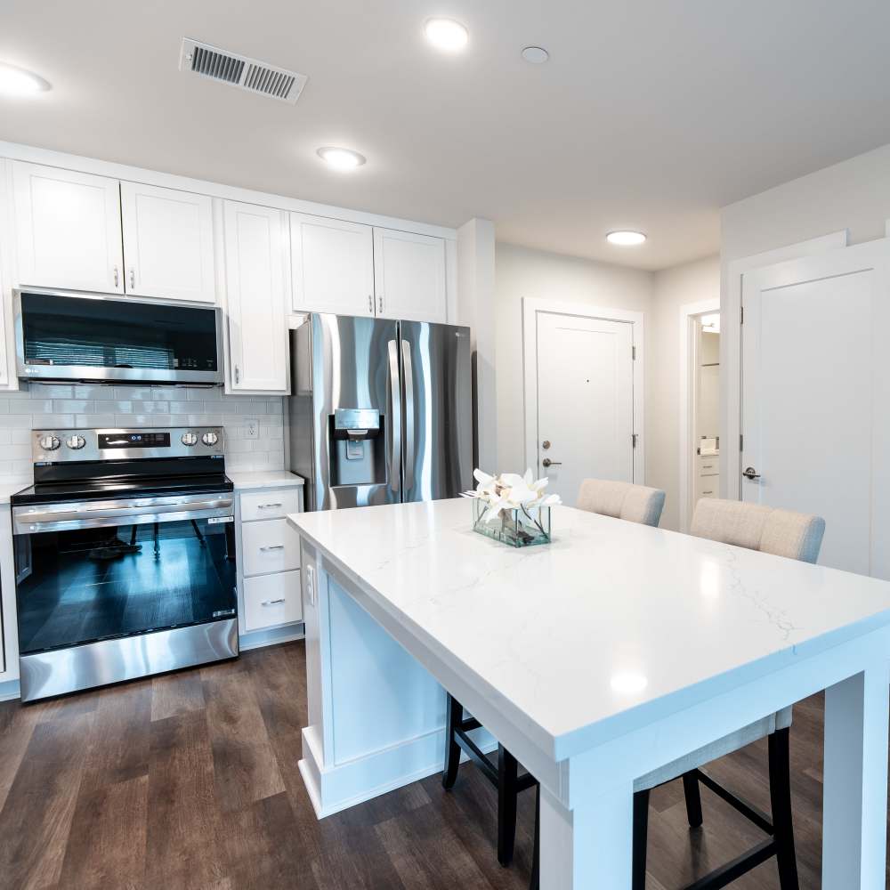 Apartment kitchen with appliances at Middleborough Station in Middleborough, Massachusetts