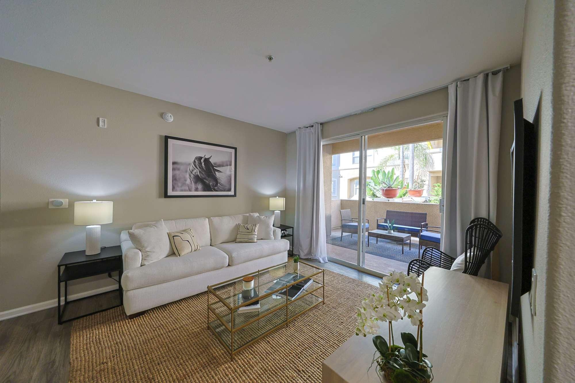 Living room with couch and chairs at Allure at Camarillo in Camarillo, California