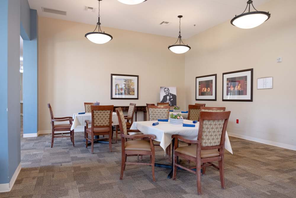 Dining room with access to living room at The Harmony Collection at Roanoke - Independent Living in Roanoke, Virginia