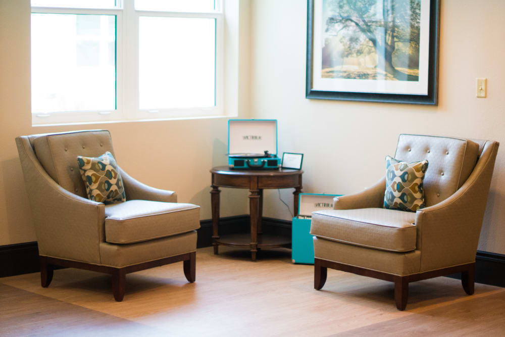 A comfy seating corner at CERTUS Premier Memory Care Living.