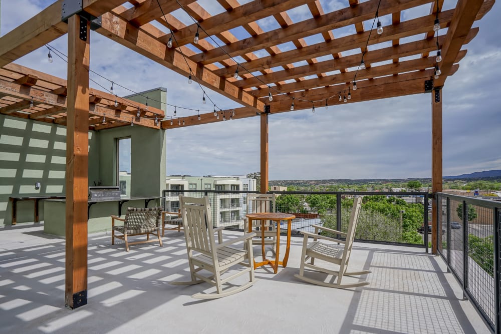 Beautiful deck seating with views of the city at Capitol Flats in Santa Fe, New Mexico