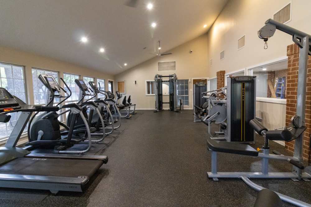 Well-equipped fitness center at Oak Ridge Apartments in San Antonio, Texas