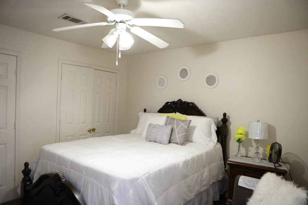 Bedroom with ceiling fan at Arrington Estates of Clarksdale in Clarksdale, Mississippi