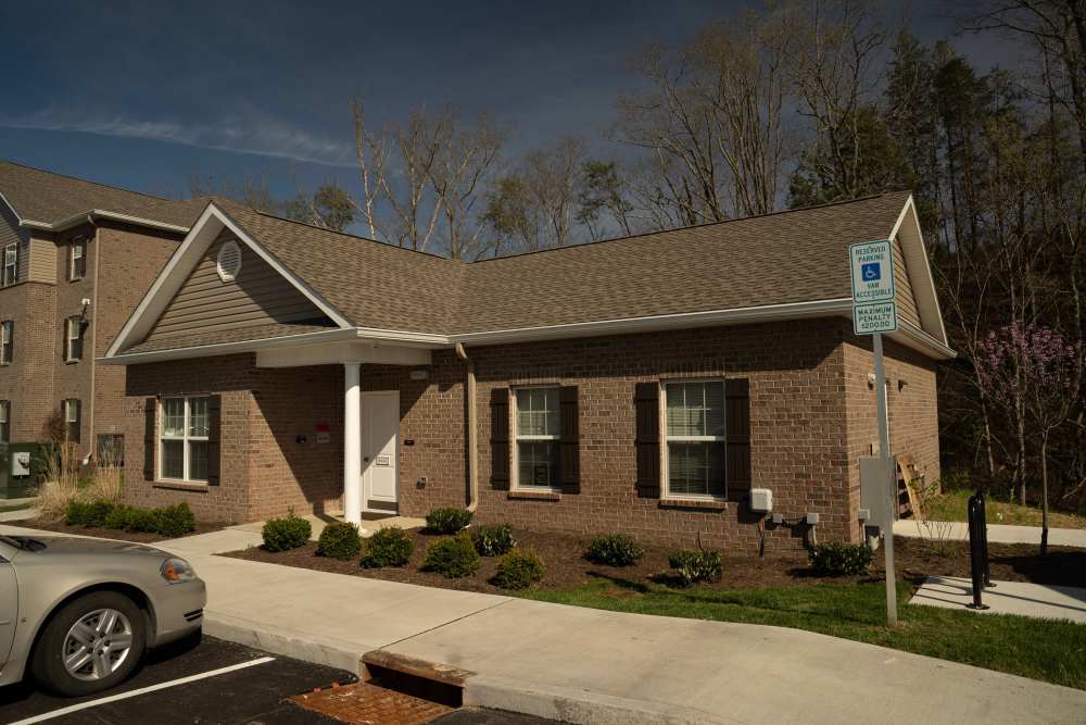 Apartment building with small garden at Douglas Greene in Kodak. TN