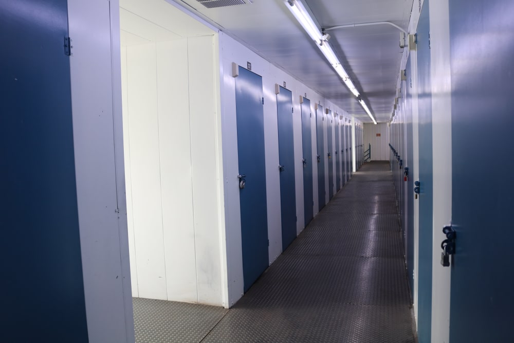 An indoor row of storage units at Golden State Storage - Sepulveda in North Hills, California