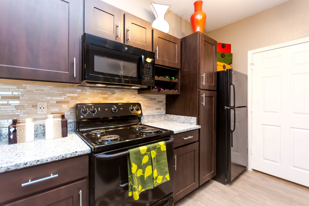 Espresso Cabinets w/ Brushed Nickel Pullsat Providence Trail in Mt Juliet, Tennessee 