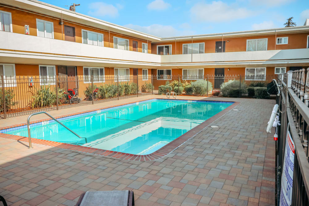 Chaise lounge chairs by the pool at Garden Court in Alameda, California