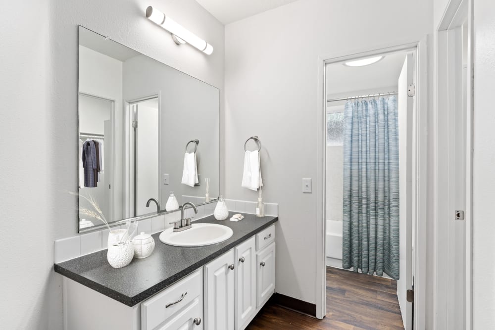 Bathroom with White Cabinets at Autumn Chase Apartments in Vancouver, Washington