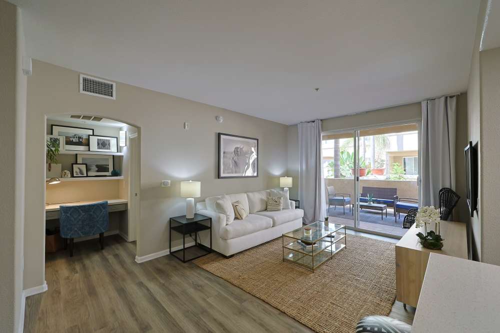 Living room with access to patio at Allure at Camarillo in Camarillo, California