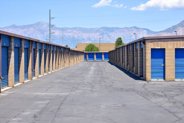 Mountain views behind exterior storage units at STOR-N-LOCK Self Storage in Riverdale, Utah