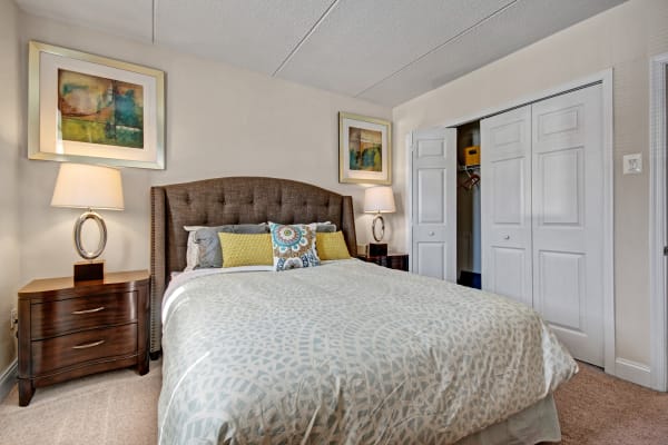 Plenty of space for storage in a model apartment bedroom at Golf Club Apartments in West Chester, Pennsylvania