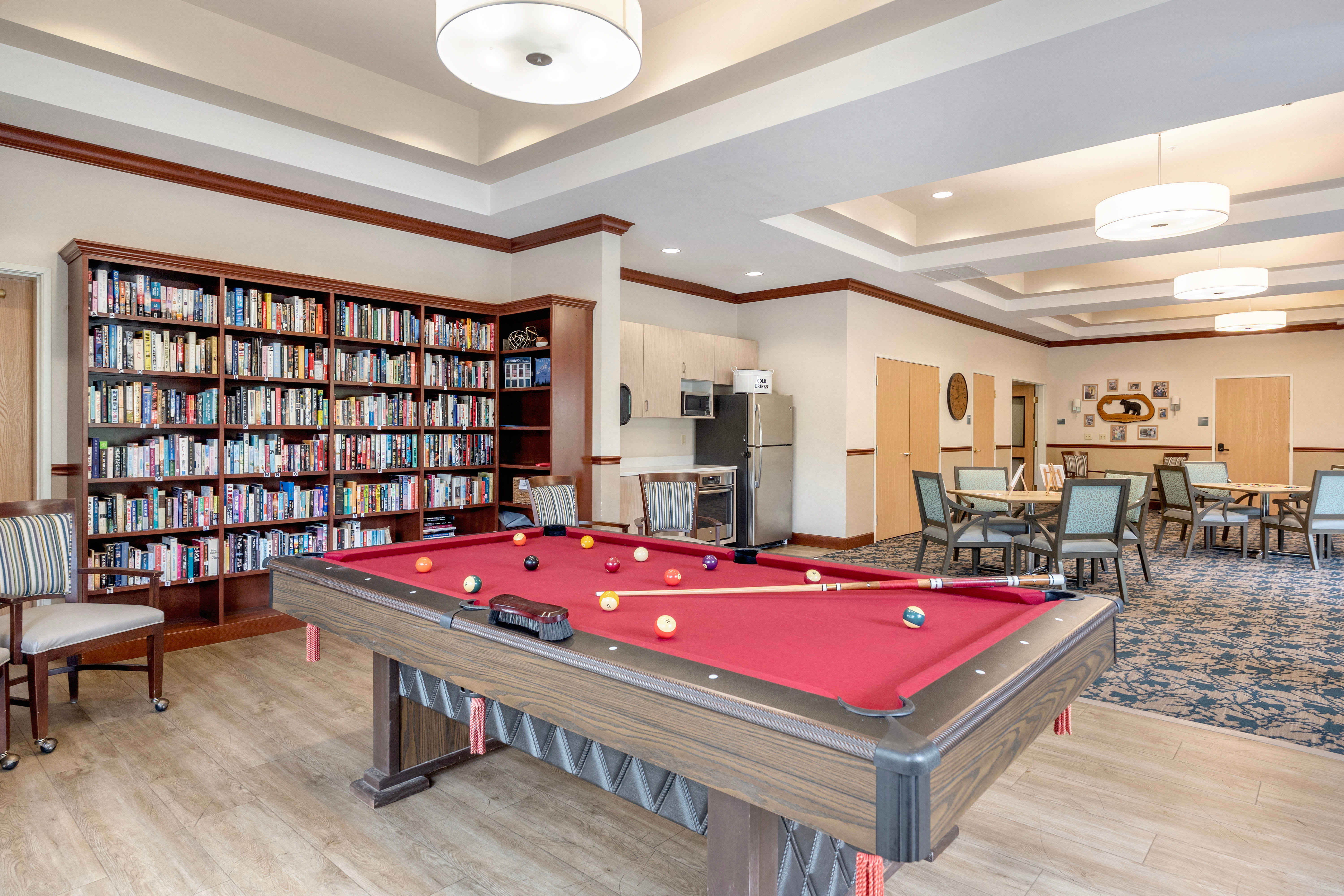 Billiards and bookcase at The Creekside in Woodinville, Washington