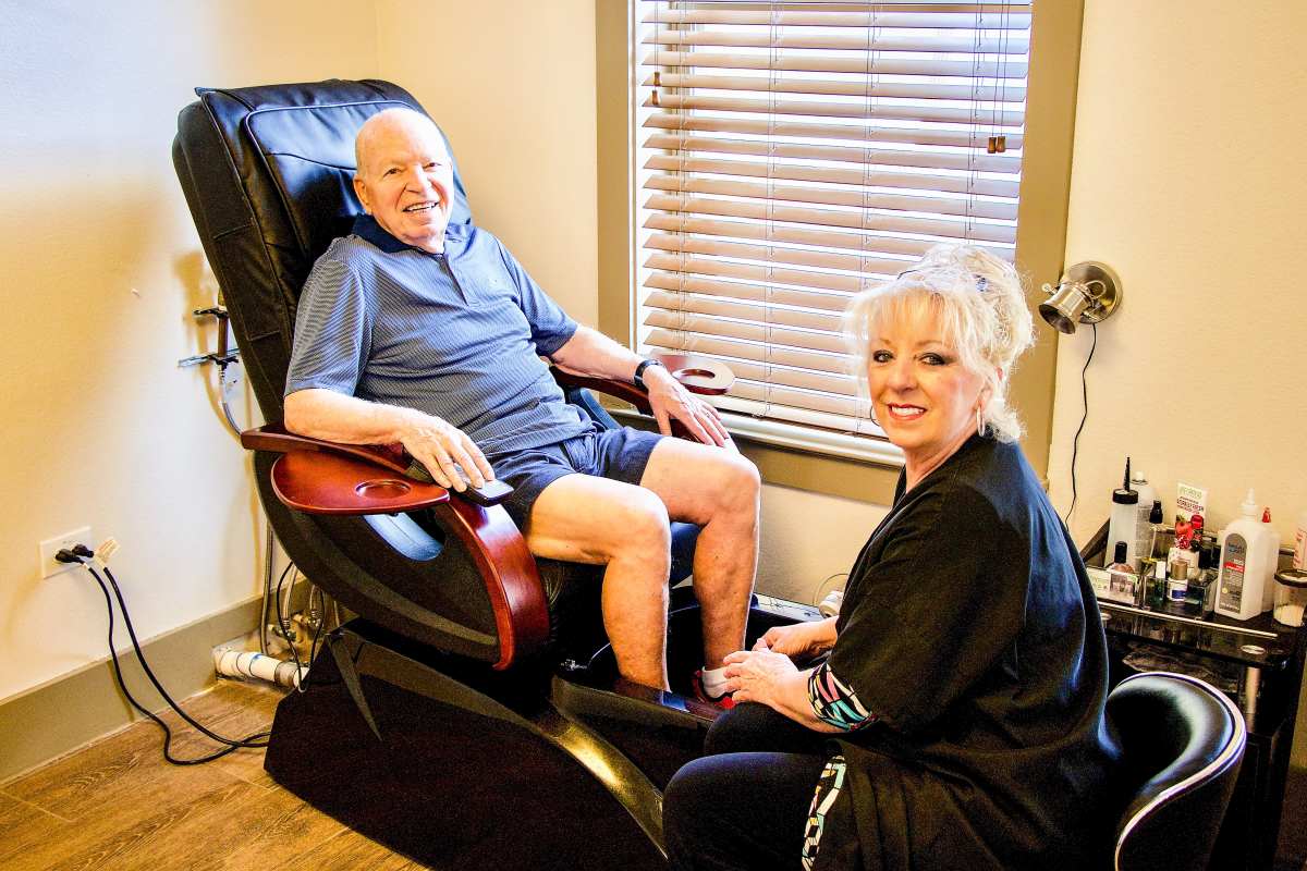 A man enjoying a pedicure at Isle at Raider Ranch in Lubbock, Texas