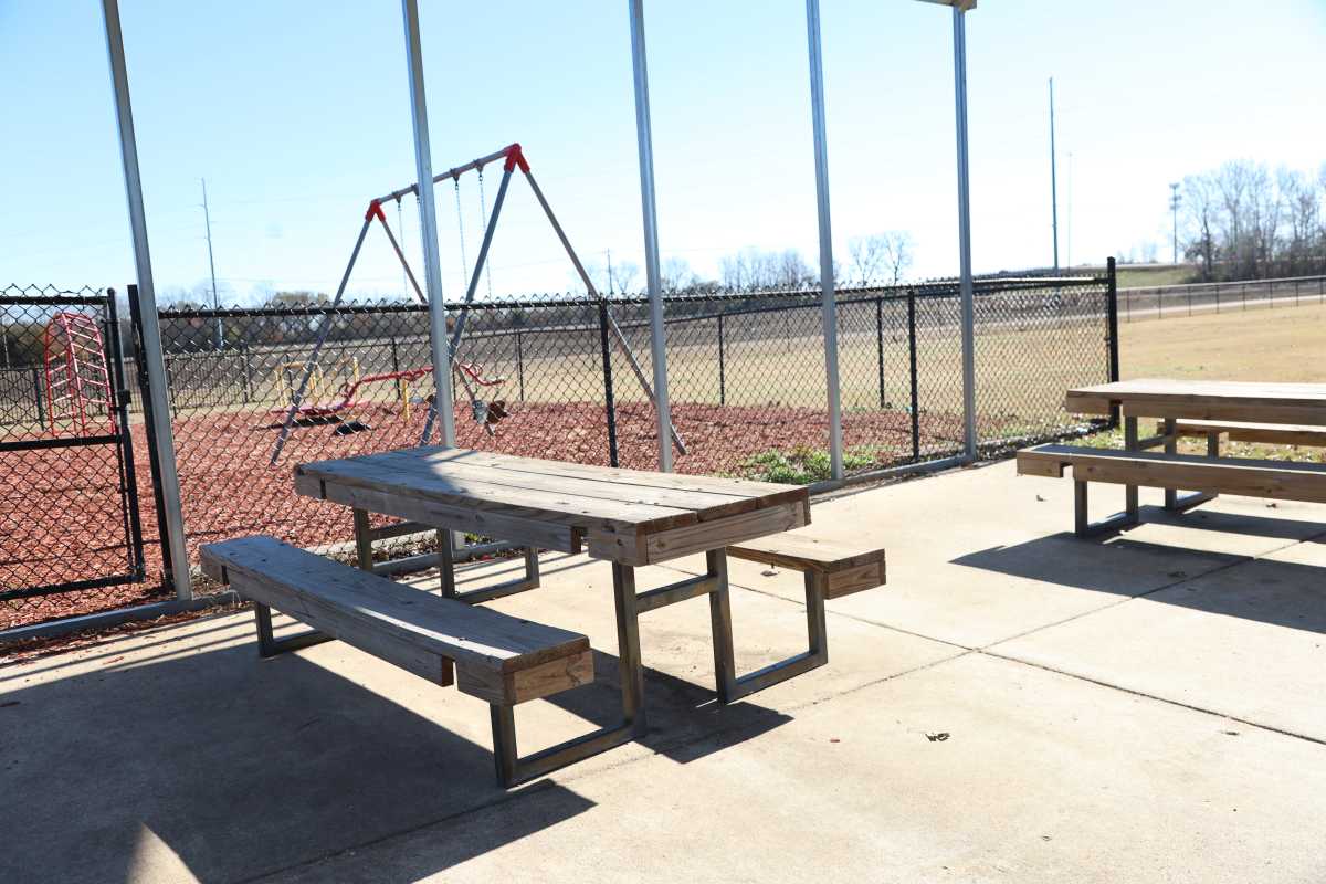 Outdoor bench sitting for the residents at Parkway Place in Greenwood, Mississippi