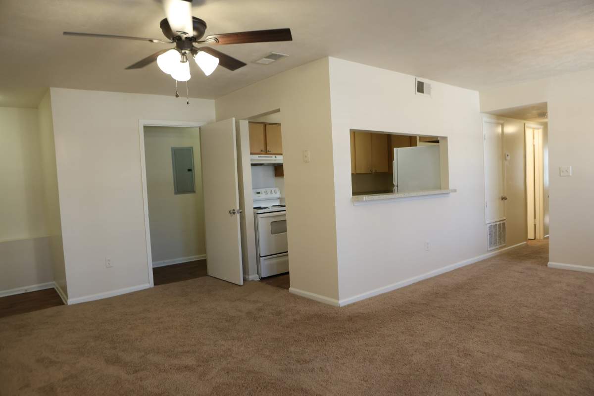 Living room with ceiling fan at Waverly Park in Jackson, Mississippi