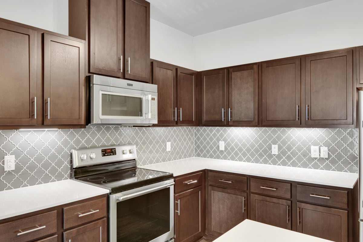 Rendering of well-appointed kitchen at Lantower Ambrosio in Pflugerville, Texas