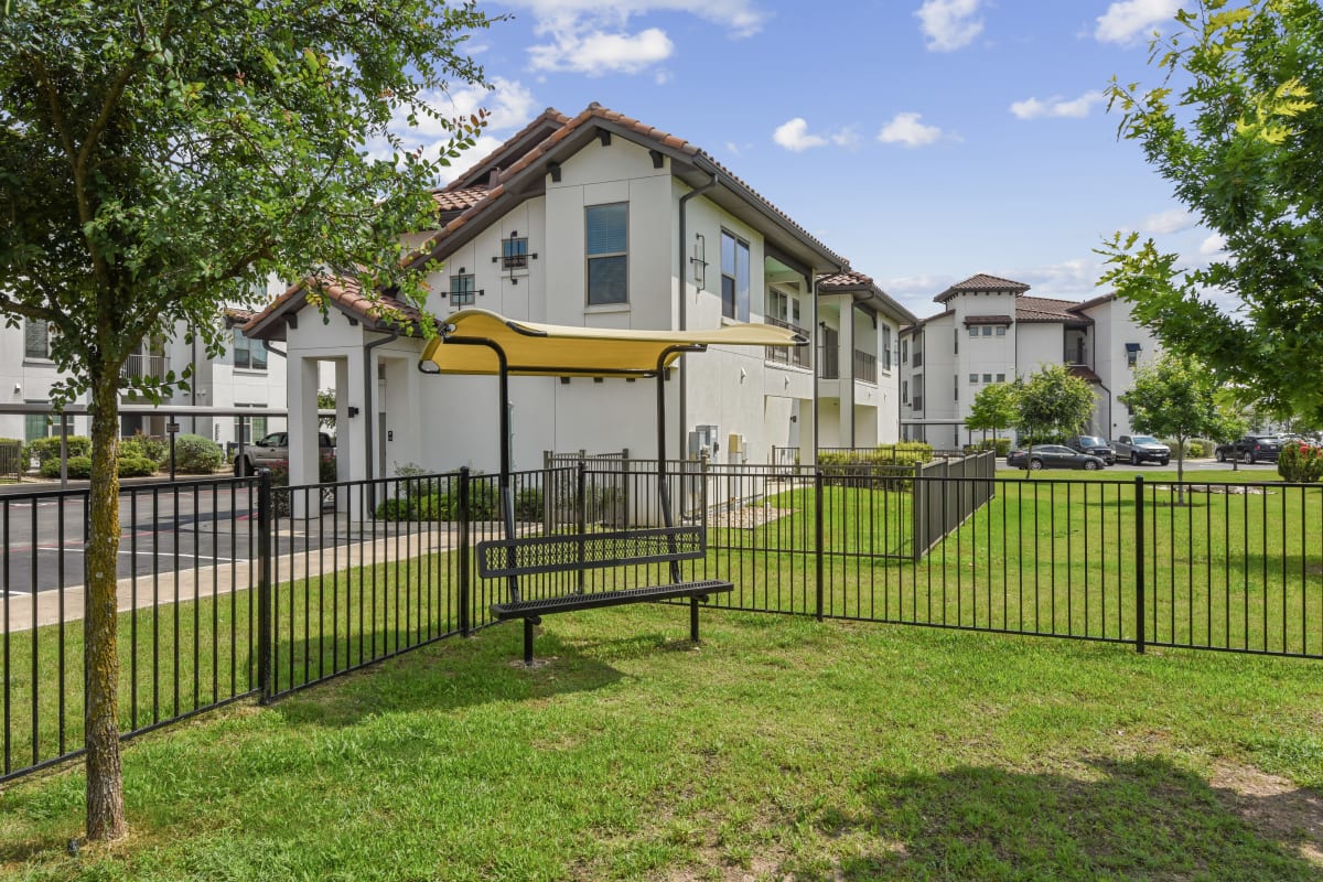 Rendering green space with bench at Lantower Ambrosio in Pflugerville, Texas