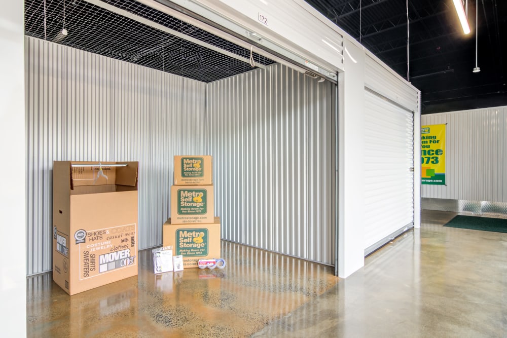 Indoor storage unit with roll up door at Metro Self Storage