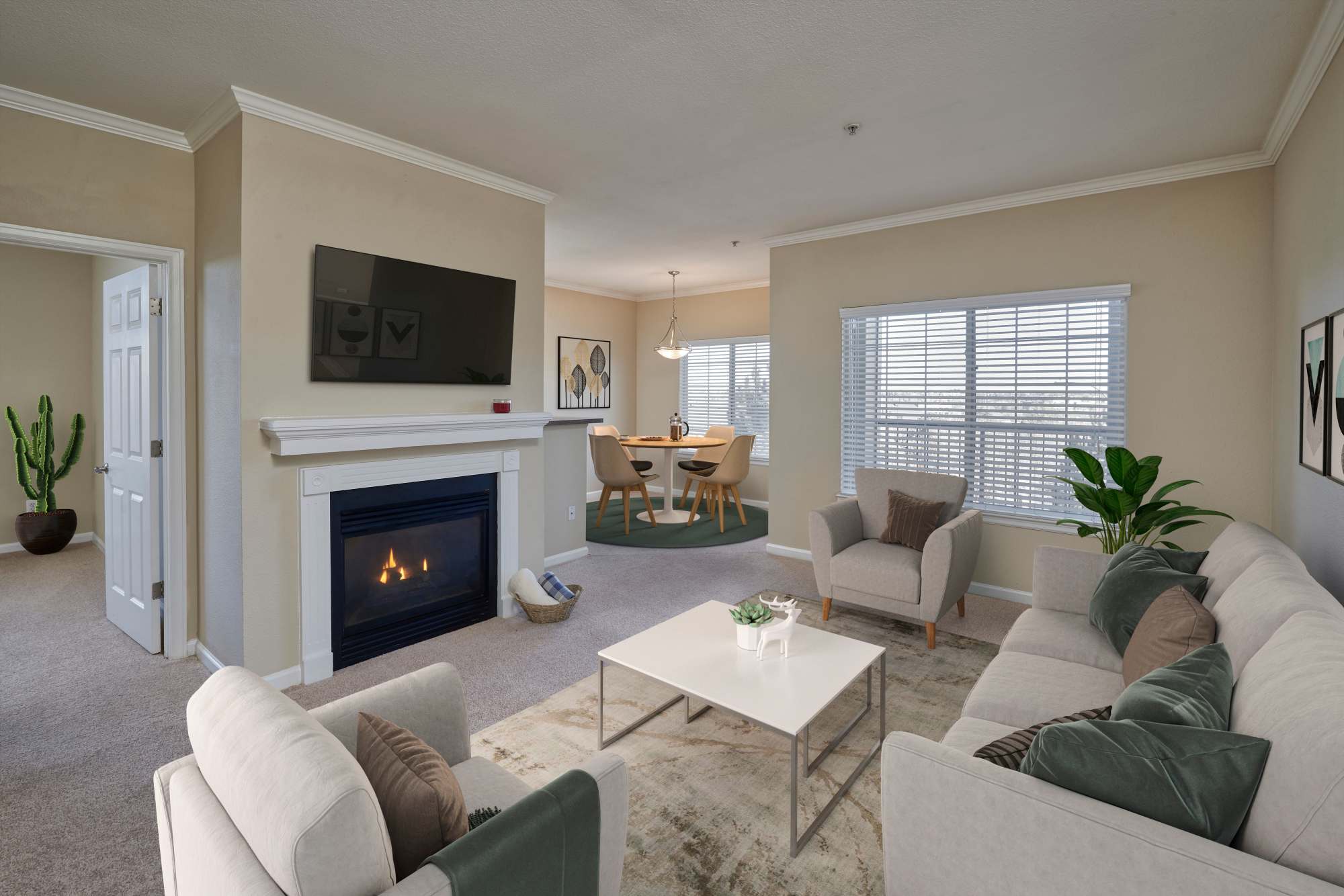 Cozy living room with fireplace at Skyecrest Apartments in Lakewood, Colorado
