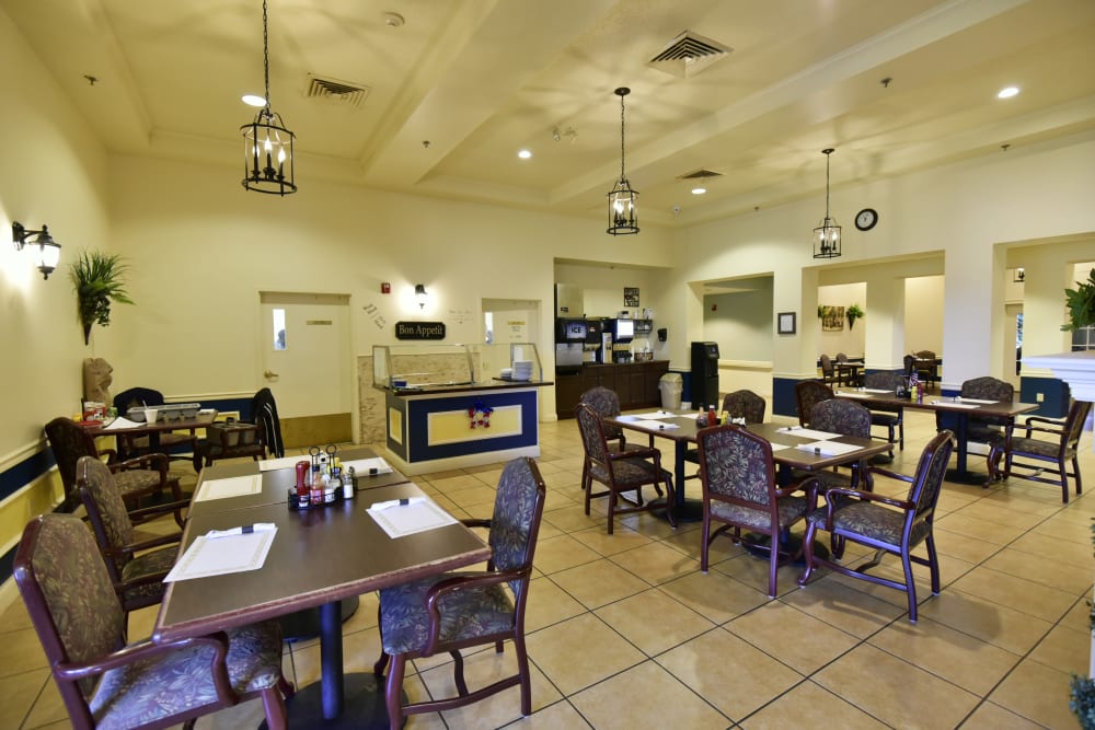 A formal dining room at Garden Place Columbia in Columbia, Illinois. 