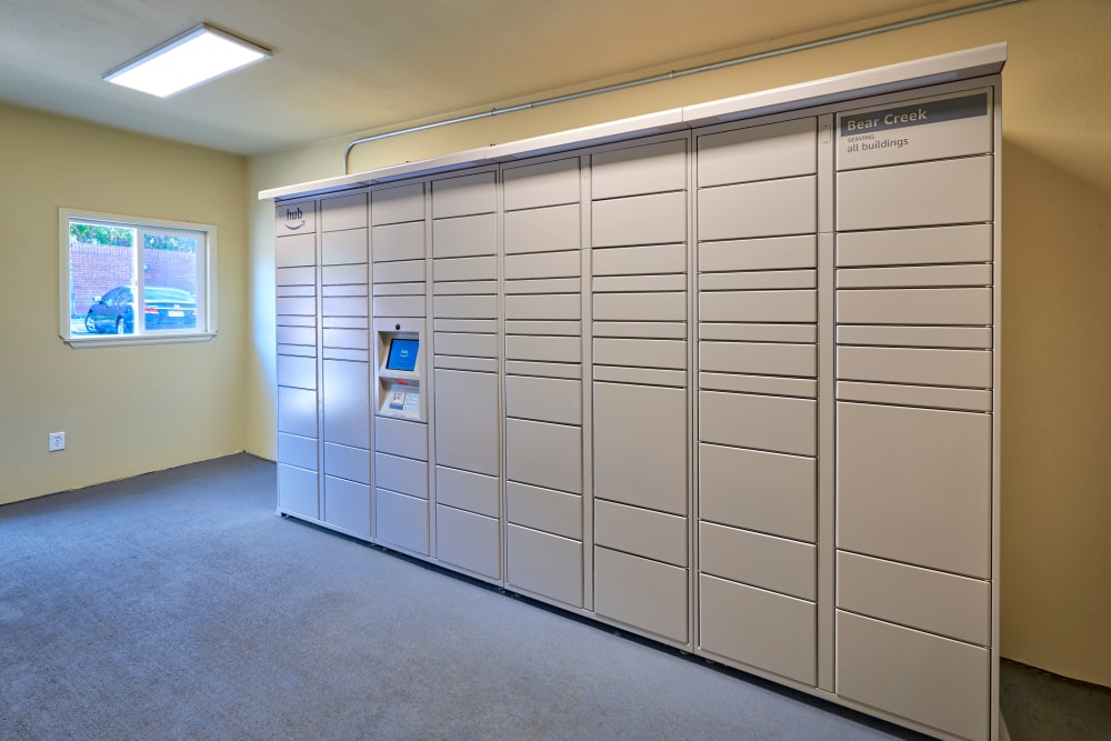 The convenient package room at The Crossings at Bear Creek Apartments in Lakewood, Colorado