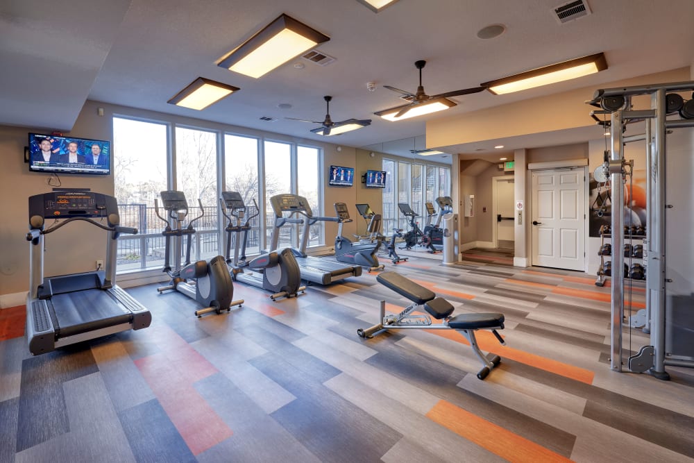 Clean, modern community gym at The Crossings at Bear Creek Apartments in Lakewood, Colorado