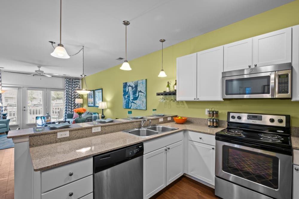 Kitchen with energy-efficient appliances at The Apartments at Spence Crossing, Virginia Beach, Virginia