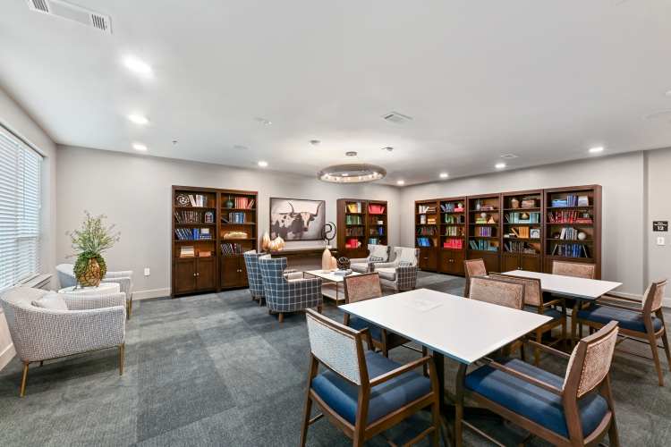 Residents enjoying happy hour at Watermere at Firewheel in Garland, Texas