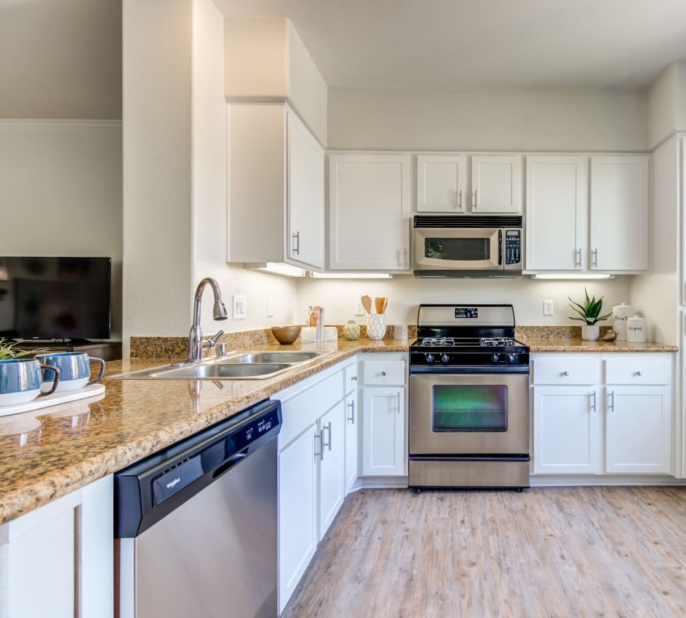 Open, spacious kitchen in a model home at Sofi Shadowridge in Vista, California