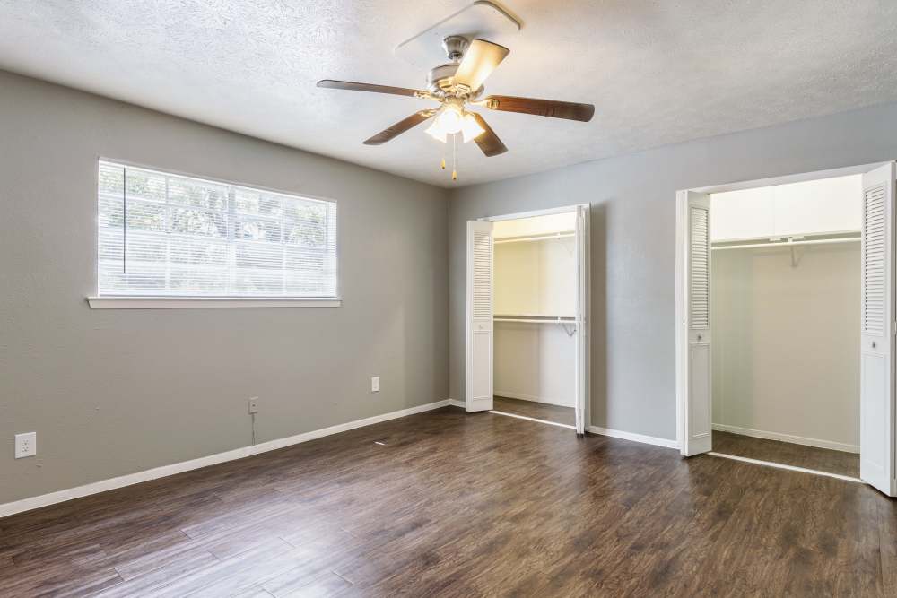 Bedroom with a ceiling fan at Royal Arms in Richardson,Texas
