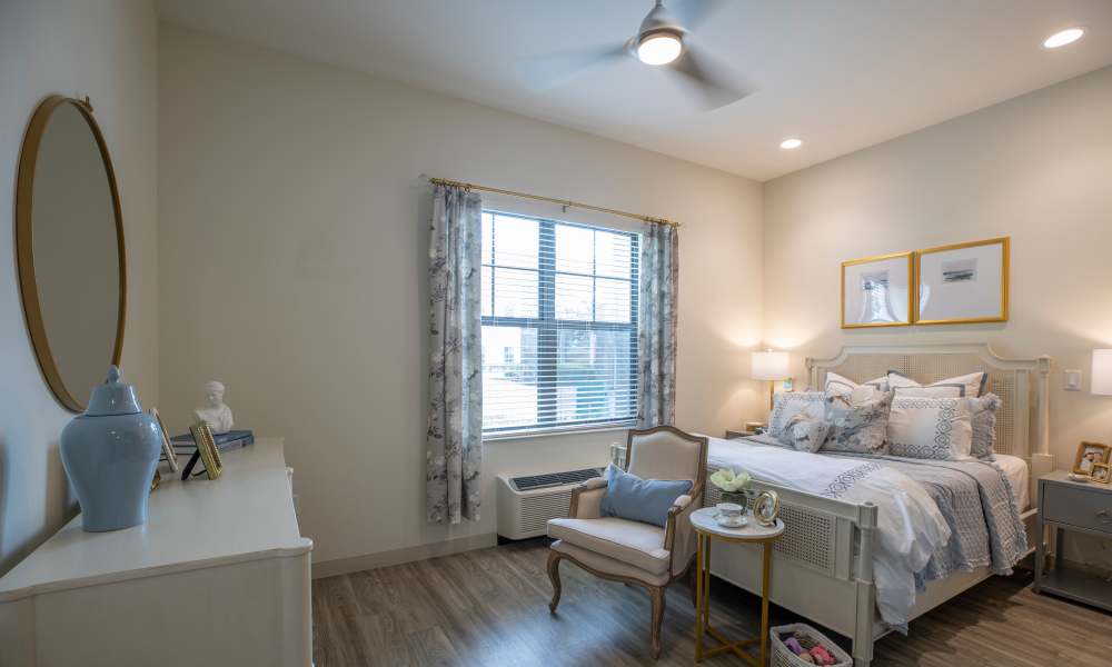 Model resident bedroom at Keystone Place at Beachwalk in Fort Myers, Florida