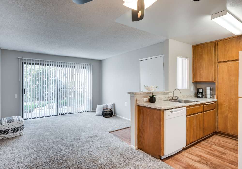 Spacious living area extending to the private balcony at The Villas at Rowland Heights in Rowland Heights, California