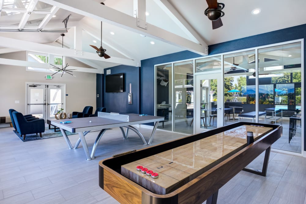 Games inside of the clubhouse at The Woodlands Apartments in Sacramento, California