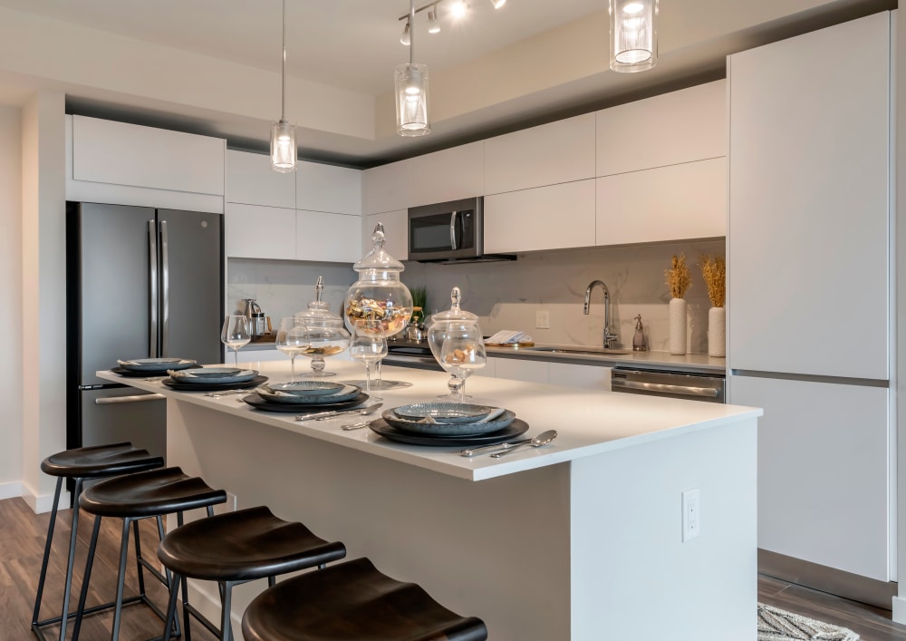 Kitchen with island and counter seating at Motif in Fort Lauderdale, Florida