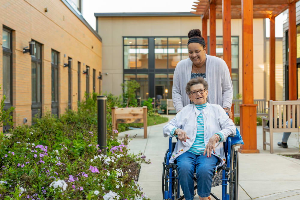 Resident being waited on at a Anthology Senior Living community